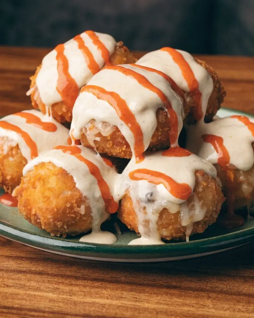 Cheesy Buffalo Ranch Chicken Bombs: The Ultimate Party Appetizer 2 codinofouad httpss.mj .runNWkeDvzfhkQ realistic Close up amate 340f5977 9664 4089 9489 4e3ddc6f5c5d 0 5