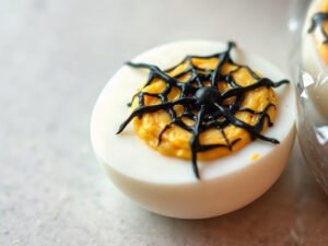 Spiderweb Deviled Eggs, fully cooked and ready to serve for two
